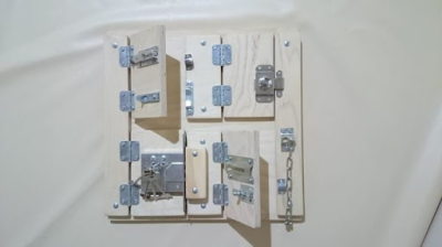 Тактильно-развивающая панель “Замочки”